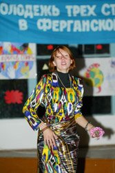 Ms. Elena Voronina, correspondent of youth newspaper Limon dancing for the camp participants
